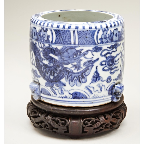 39 - CHINESE BLUE AND WHITE 'DRAGON' CENSERMING OR LATERthe cylindrical sides painted in tones of undergl... 