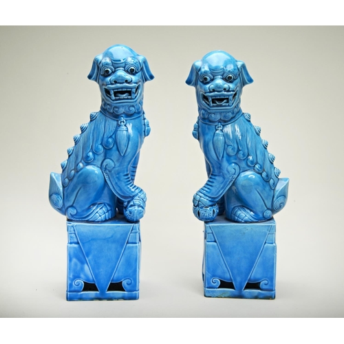 50 - PAIR OF TURQUOISE-GLAZE BUDDHISTIC LIONSLATE QING DYNASTYmodelled as the female with a pup playing u... 