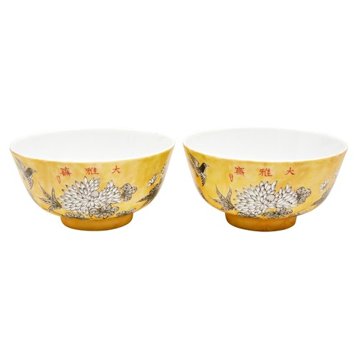 90 - PAIR OF GRISAILLE DECORATED YELLOW-GROUND BOWLS20TH CENTURYthe exterior painted with birds amidst pe... 