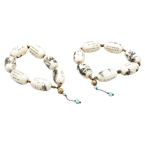 199 - PAIR OF IVORY BEAD BANGLESREPUBLIC PERIODthe beads each inscribed and finely engraved with figures i... 