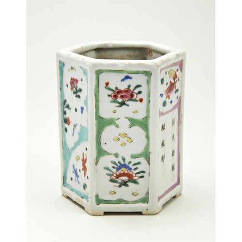 100 - HEXAGONAL INSCIRBED FAMILLE ROSE BRUSH POTQING DYNASTYthe sides painted with panels of flowers, fish... 