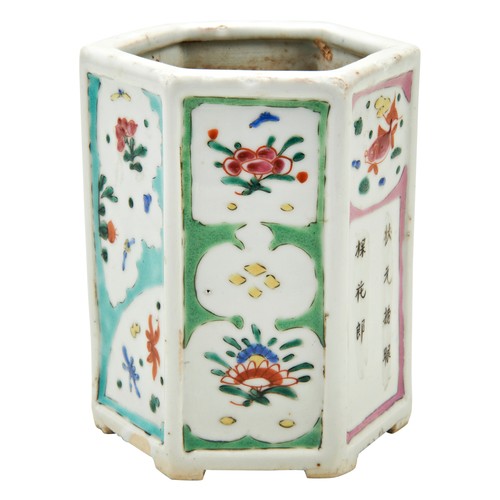 100 - HEXAGONAL INSCIRBED FAMILLE ROSE BRUSH POTQING DYNASTYthe sides painted with panels of flowers, fish... 