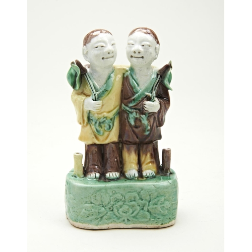 102 - SANCAI GLAZED 'BOYS' INCENSE BURNERKANGXI PERIOD (1662-1722)modelled as the ho ho twins13cm high... 