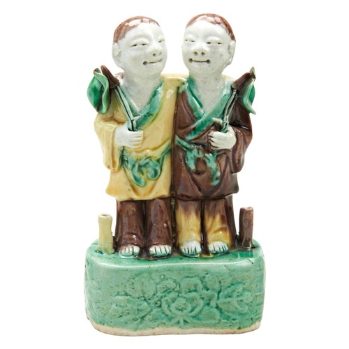 102 - SANCAI GLAZED 'BOYS' INCENSE BURNERKANGXI PERIOD (1662-1722)modelled as the ho ho twins13cm high... 