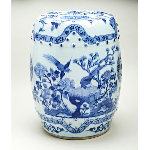 41 - BLUE AND WHITE GARDEN SEATQING DYNASTY, 19TH CENTURYpainted with a continuous garden scene with exot... 