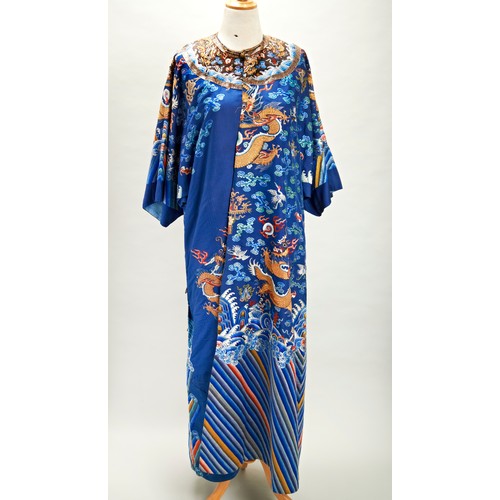 239 - EMBROIDERED BLUE-GROUND 'DRAGON' ROBE, MANGPAOQING DYNASTY, 19TH CENTURYwith alterations, worked in ... 