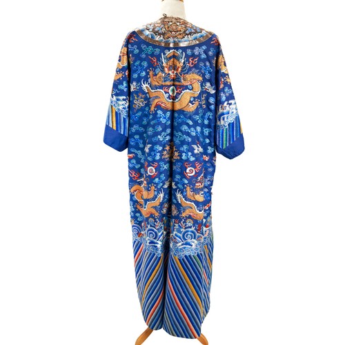 239 - EMBROIDERED BLUE-GROUND 'DRAGON' ROBE, MANGPAOQING DYNASTY, 19TH CENTURYwith alterations, worked in ... 