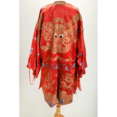 241 - EMBROIDRED HAN-CHINESE RED GROUND SILK ROBELATE 19TH / EARLY 20TH CENTURYworked in couched gold thre... 