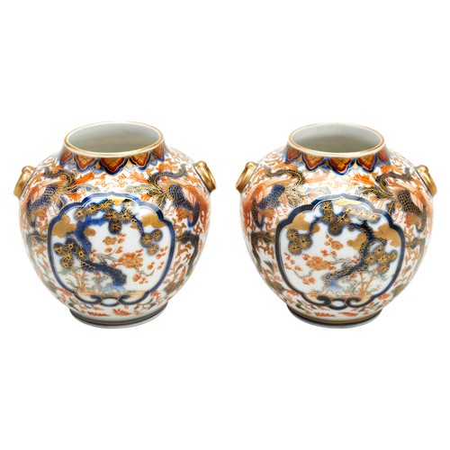 285 - PAIR OF SMALL IMARI VASESFUKAGAWA, MEIJI PERIOD (1868-1912)the globular sides with twin loop handles... 