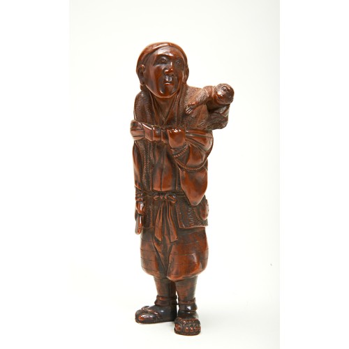 308 - RARE CARVED BOXWOOD OKIMONOEDO PERIOD, 18TH CENTURYmodelled as an elderly man carrying a monkey on h... 