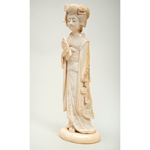 309 - FINE JAPANESE IVORY OKIMONO OF A BIJIN MEIJI PERIOD (1868-1912)carved wearing a flowing kimono decor... 