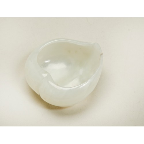 196 - FINE WHITE JADE PEACH-FORM BRUSH WASHERQING DYNASTY, 18TH CENTURYdelicately carved in the form of a ... 