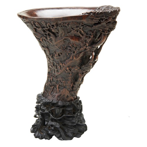 232 - IMPRESSIVE CARVED AGAR WOOD LIBATION CUP WITH FITTED BLACKWOOD STANDQING DYNASTY, 19TH CENTURY te si... 