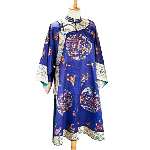 242 - EMBROIDERED BLUE SILK HOUSE LADIES ROBELATE QING DYNASTYfinely worked with figurative roundels and a... 