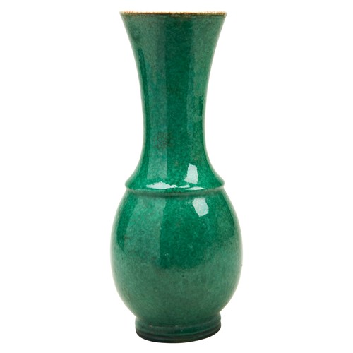 69 - APPLE-GREEN GLAZE TRUMPET VASELATE QING DYNASTYthe sides covered in a fine crackle green-glaze, dril... 