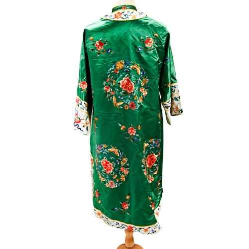 243 - EMBROIDERED GREEN-SILK LADIES ROBE20TH CENTURYfinely worked with foliate roundels; together with TWO... 