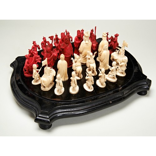 233 - RARE CANTONESE CARVED IVORY 'KING GEORGE AND QUEEN CHARLOTTE' CHESS SETQING DYNASTY, EARLY 19TH CENT... 