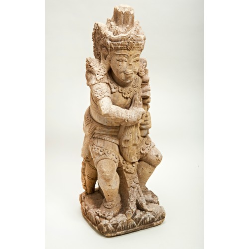 332 - LARGE CARVED LAVA-STONE FIGURE OF VISHNUINDIA, 19TH CENTURY shown seated wearing elaborate jewellery... 