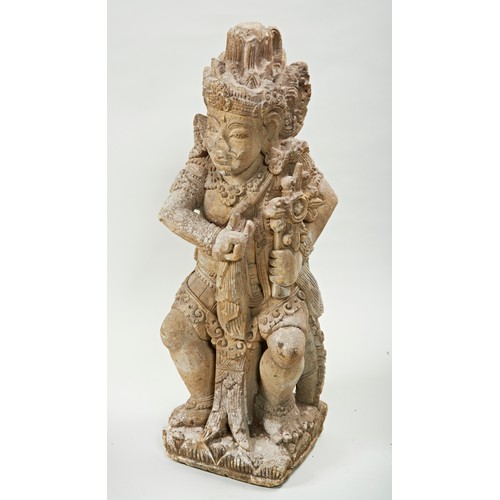 332 - LARGE CARVED LAVA-STONE FIGURE OF VISHNUINDIA, 19TH CENTURY shown seated wearing elaborate jewellery... 