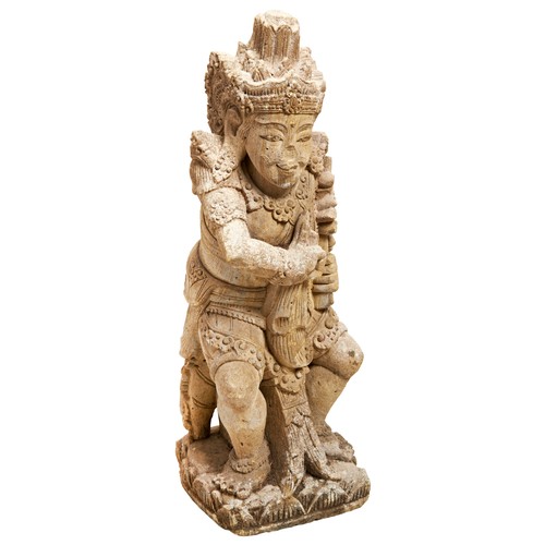 332 - LARGE CARVED LAVA-STONE FIGURE OF VISHNUINDIA, 19TH CENTURY shown seated wearing elaborate jewellery... 