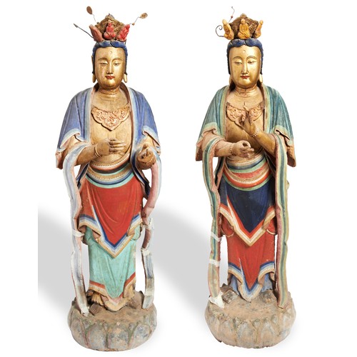 218 - RARE PAIR OF MONUMENTAL POLYCHROME PAINTED STUCCO BODDISATVASYUAN-MING DYNASTY shown standing on a l... 