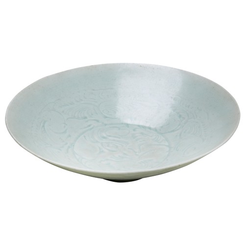 29 - QINGBAI-GLAZED BOWLSONG DYNASTY OR LATERthe interior densely incised with scrolling stylised foliage... 