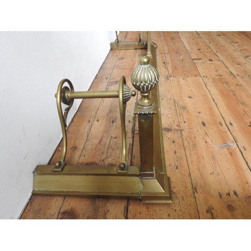 96 - AN ORNATE 19TH CENTURY BRASS FIRE CURB, with integrated fire dog rails, balloon finials and ornate f... 