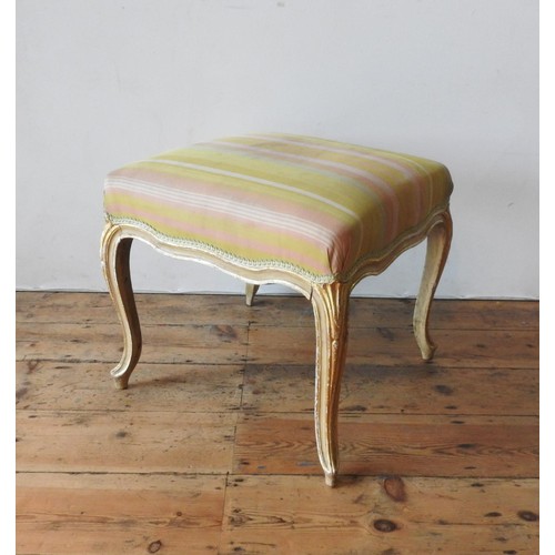 12 - A FRENCH 19TH CENTURY GILDED SALON STOOL, on cabriolet legs, 37cm high, 49cm square