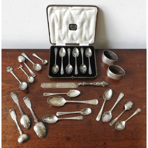 408 - A SET OF SIX HALLMARK SILVER TEASPOONS, TWO SILVER NAPKING RINGS, BUTTER KNIFE AND SIXTEEN VARIOUS S... 