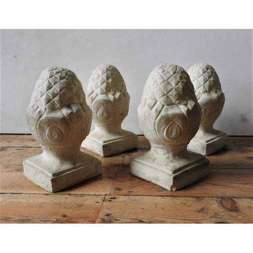 94 - TWO PAIRS OF RECONSTITUTED STONE GARDEN FINIALS, 32cm high