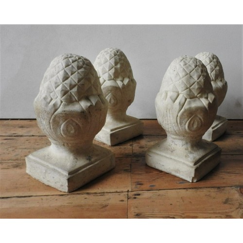 94 - TWO PAIRS OF RECONSTITUTED STONE GARDEN FINIALS, 32cm high