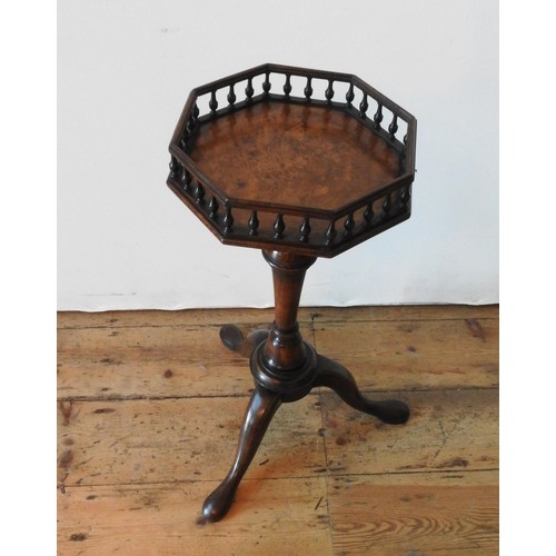 28 - A 19TH CENTURY WALNUT TRIPOD TABLE WITH GALLERY EDGED OCTAGONAL TOP, with a tapered turned pedestal ... 