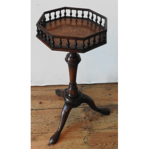 28 - A 19TH CENTURY WALNUT TRIPOD TABLE WITH GALLERY EDGED OCTAGONAL TOP, with a tapered turned pedestal ... 