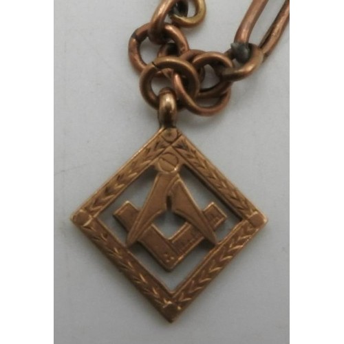 450 - A 9CT GOLD WATCH CHAIN WITH A 9CT GOLD MASONIC FOB, the clasp at one end of the chain appears to be ... 