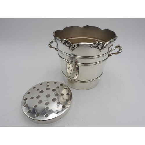 411 - A PERUVIAN SILVER ICE BUCKET BY CAMUSSO, tapered ribbed form with two scroll handles and lotus flowe... 