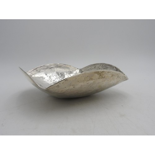 414 - A PERUVIAN HAMMERED SILVER BOWL, square shaped with curved edges, stamped 925, 7.5 oz