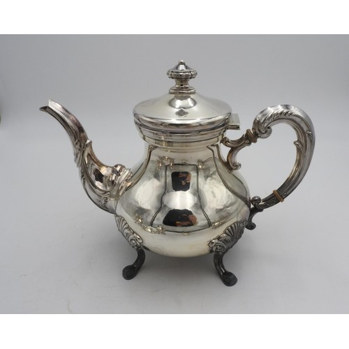 422 - A PERUVIAN SILVER TEA AND COFFEE SERVICE BY CAMUSSO, comprising of a tea pot, coffee pot, hot water ... 