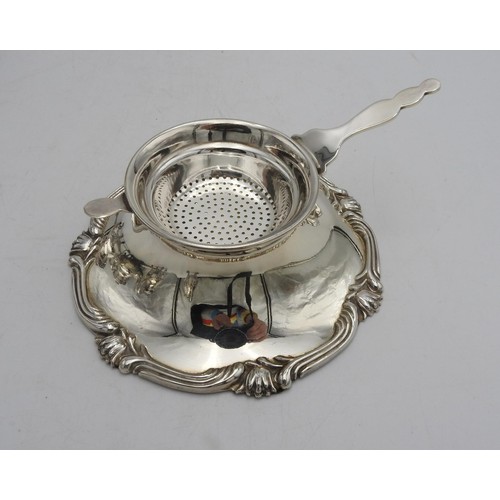 422 - A PERUVIAN SILVER TEA AND COFFEE SERVICE BY CAMUSSO, comprising of a tea pot, coffee pot, hot water ... 