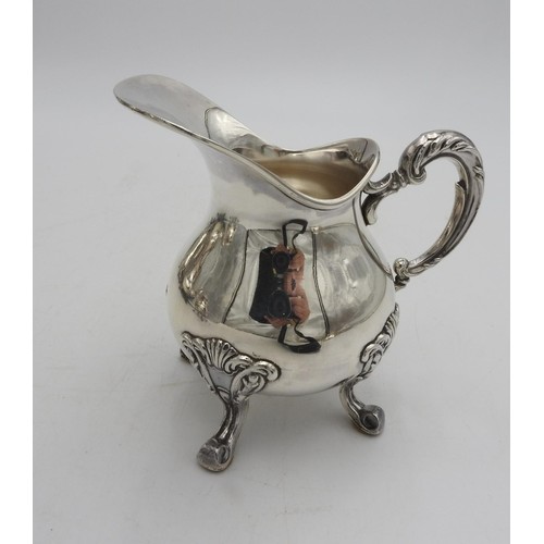 422 - A PERUVIAN SILVER TEA AND COFFEE SERVICE BY CAMUSSO, comprising of a tea pot, coffee pot, hot water ... 