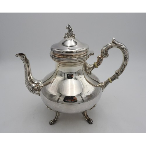 423 - LARGE PERUVIAN SILVER TEAPOT BY CAMUSSO, with ornate acanthus detailingHeight 25cm. 25.5 ounces... 