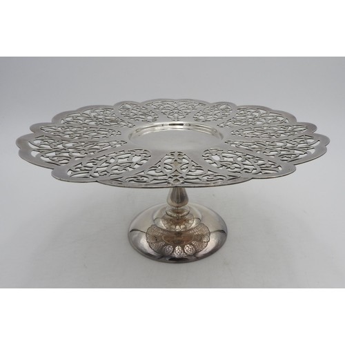 429 - A PARAMOUNT 'ROSEPOINT' SILVER PLATED CAKE STAND, ornate pierced fretwork design on a tapered pedest... 