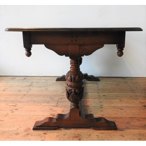 45 - AN OAK 20TH CENTURY JACOBEAN STYLE REFECTORY TABLE, with carved baluster supports, finial corners an... 