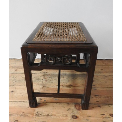 48 - A WHYTOCK & REID MAHOGANY ANGLO-CHINESE STOOL WITH CANE SEAT PANEL