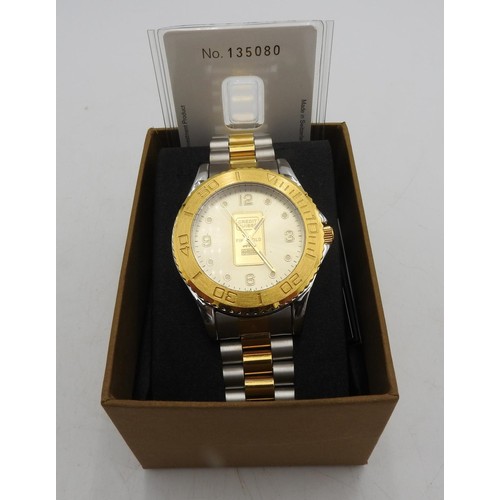 445 - A GENT'S CREDIT SUISSE GOLD PLATED STAINLESS STEEL WRISTWATCH SET WITH GOLD INGOT, water reistant wi... 