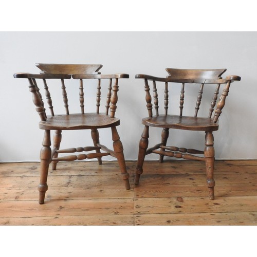 63 - A 19TH CENTURY ELM SEAT SMOKER'S BOW CHAIR AND ONE OTHER, with twin stretcher bar supports, turned l... 