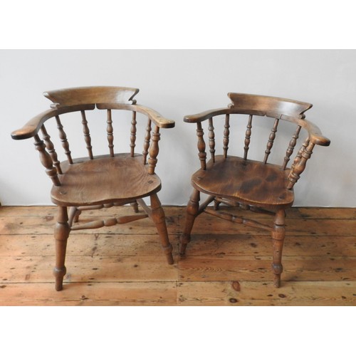 63 - A 19TH CENTURY ELM SEAT SMOKER'S BOW CHAIR AND ONE OTHER, with twin stretcher bar supports, turned l... 