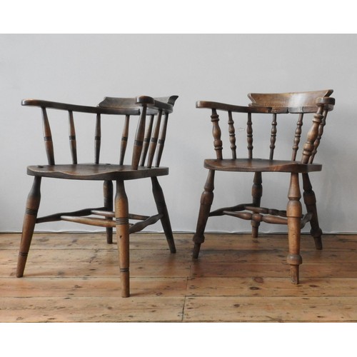 64 - TWO 19TH CENTURY SMOKER'S BOW CHAIRS, with twin stretcher bar supports, turned legs and turned pilla... 