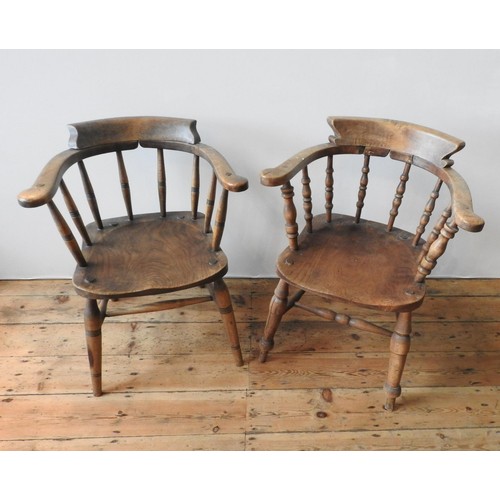 64 - TWO 19TH CENTURY SMOKER'S BOW CHAIRS, with twin stretcher bar supports, turned legs and turned pilla... 