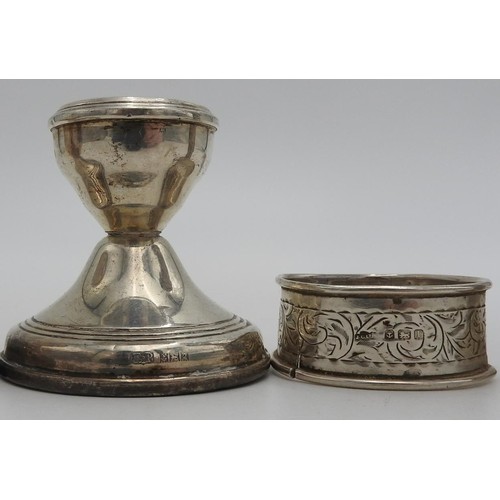 436 - A PAIR OF HALLMARK SILVER CANDLESTICKS, HALL MARK SILVER VASE AND NAPKIN RING, the silver trumpet va... 