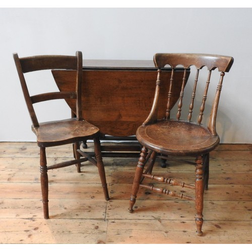 71 - AN OAK GATE-LEG TABLE WITH TWO VICTORIAN SIDE CHAIRS AND A WICKER LOG BASKET, the gate-leg table mea... 